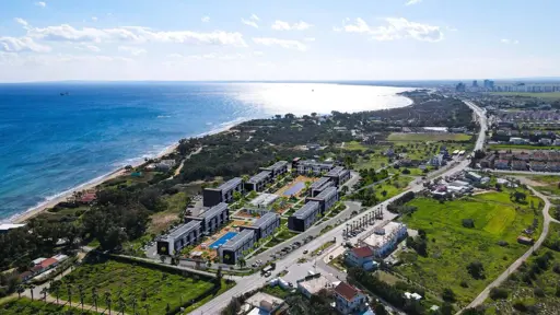 Пляжная недвижимость (2 комнаты, 1 ванная) с видом на море и спа-зоной на Северном Кипре Ени Искеле